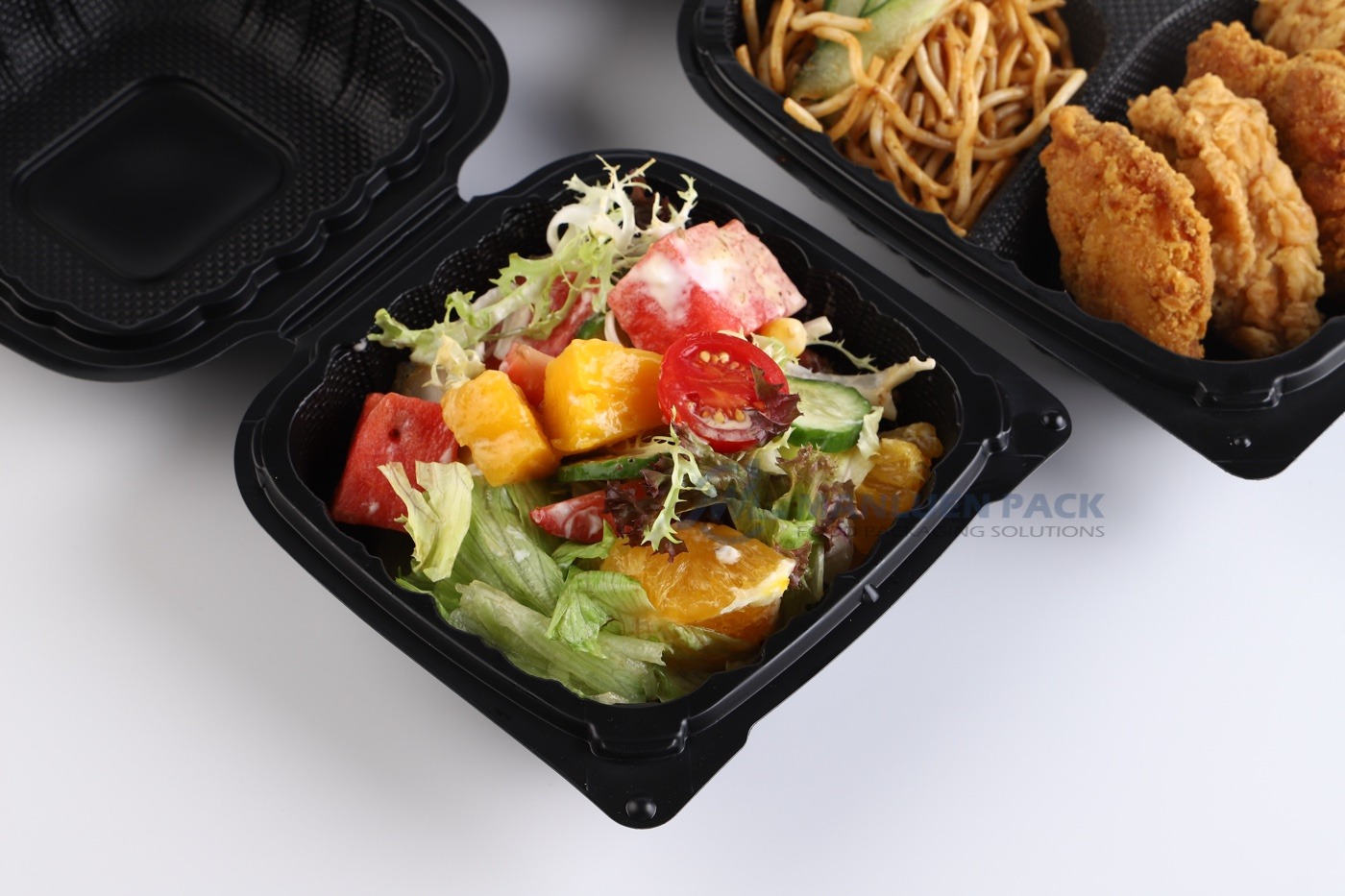 61 Black Clamshell Salad And Fried Food Close Up