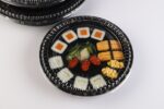 WL53 sushi tray with transparent lid showing black base and clear food packaging structure