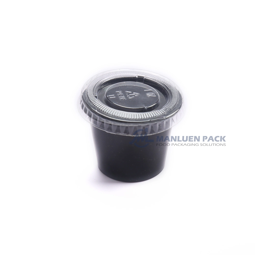 WL-1OZ Sauce Cups with Lids | Manluen Pack WL-1OZ clear and black 1 oz sauce cups with lids for takeaway food service