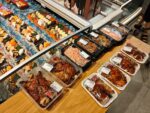 Wl 8507 Prepared Sushi And Meal Trays At Store Counter