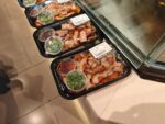 Wl 8525 Prepared Meat Trays At Store Counter Close Up