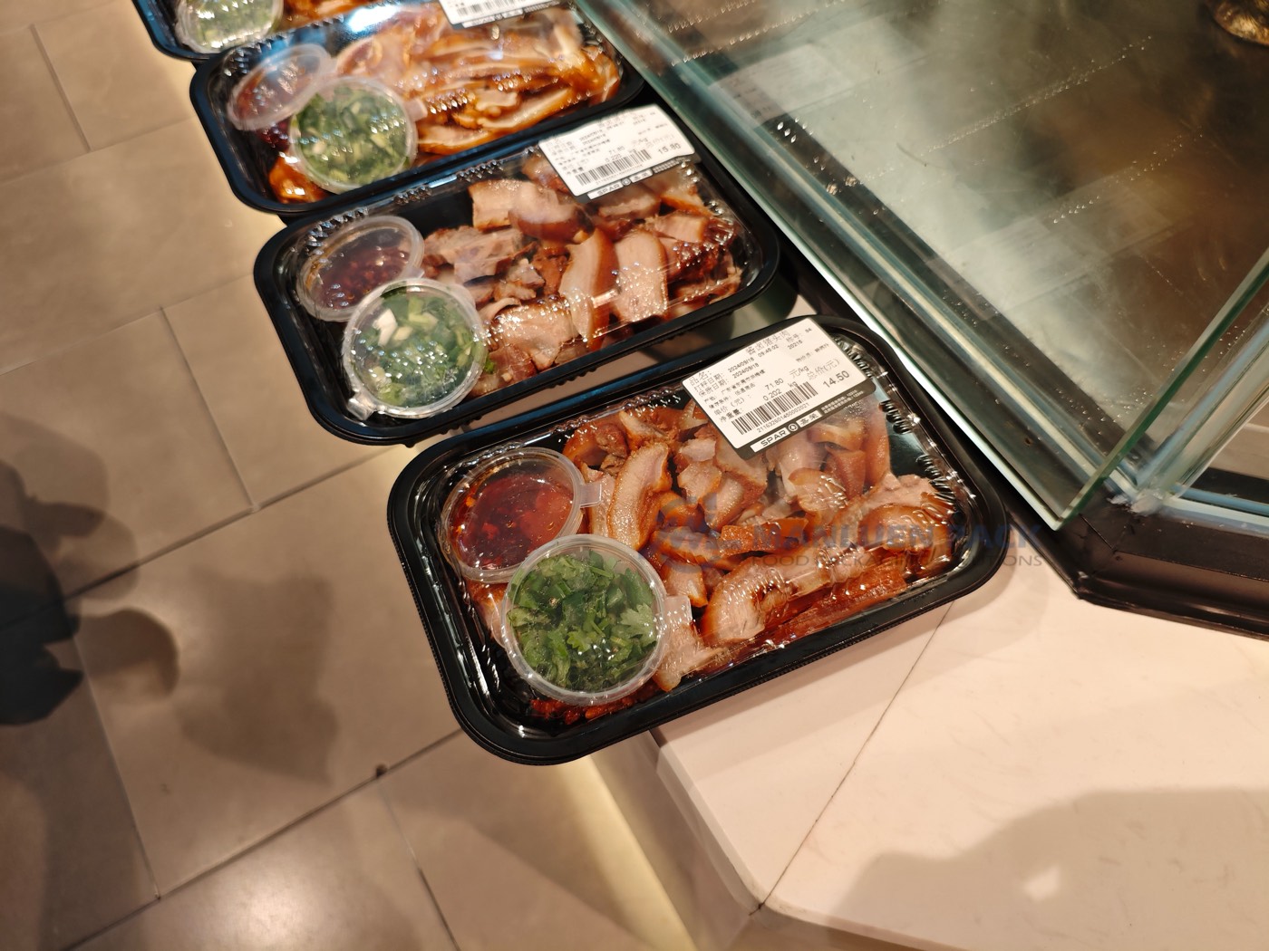 Wl 8525 Prepared Meat Trays At Store Counter Close Up