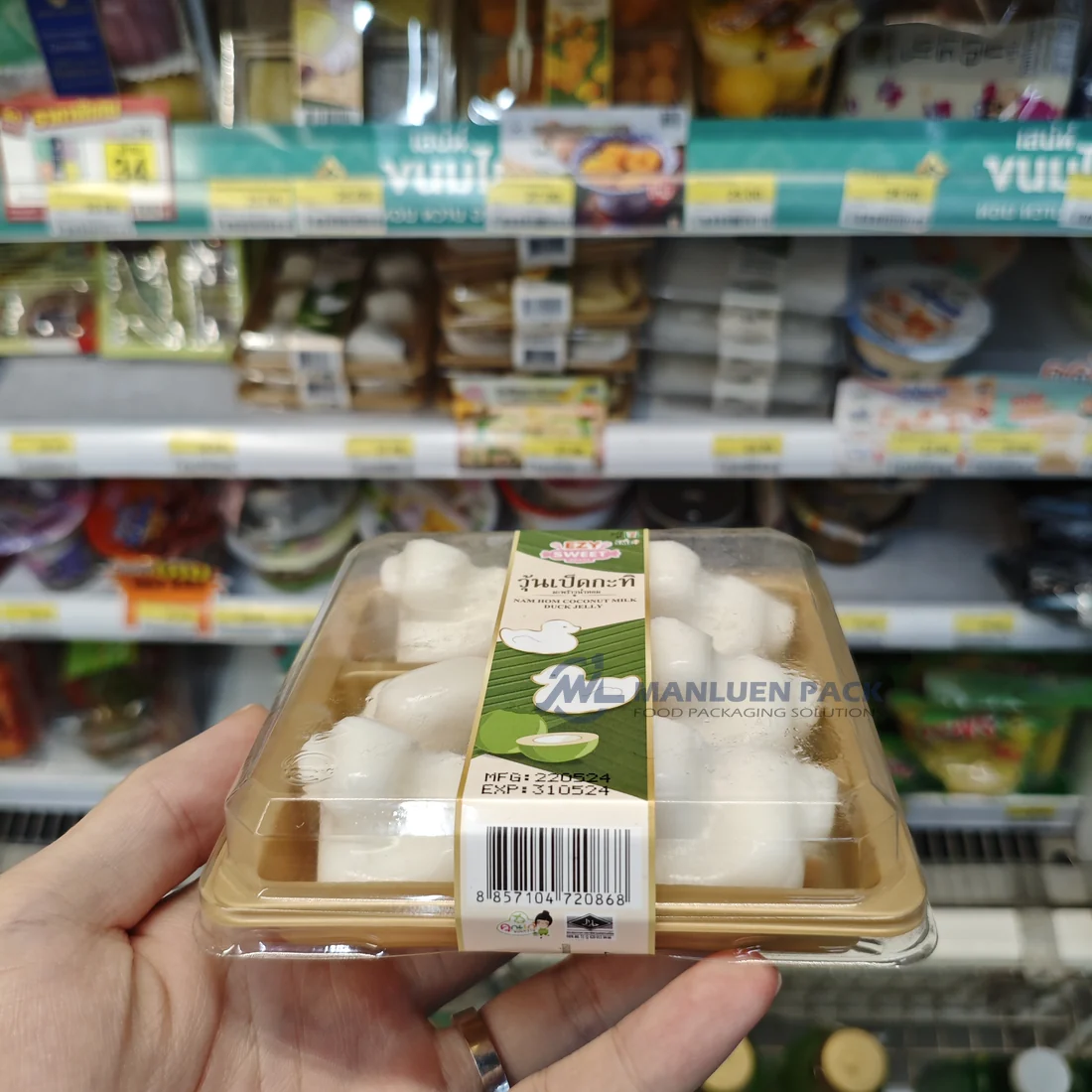 WL-0.1 small gold sushi tray package displayed by a shopper in a retail store