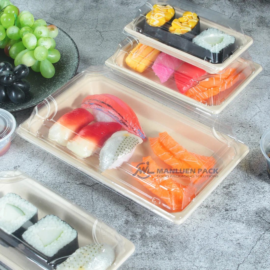 WL-0.6 Bagasse Sushi Tray Food Display | Manluen Pack WL-0.6 bagasse sushi tray filled with sushi for takeaway food presentation