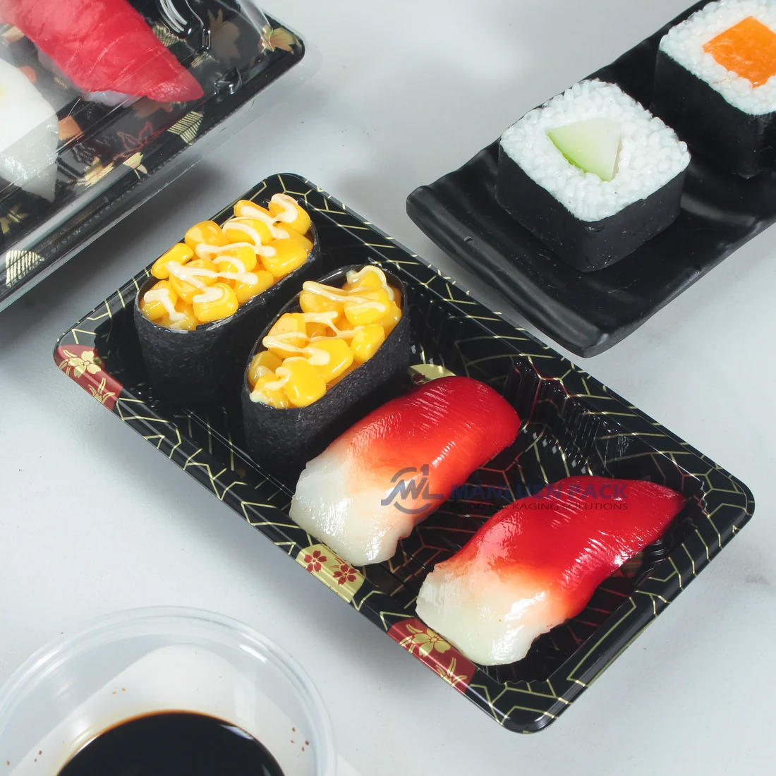 Black WL-0.6 sushi tray presenting assorted nigiri and gunkan sushi