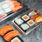 WL-05 sushi trays with assorted sushi in a tabletop presentation