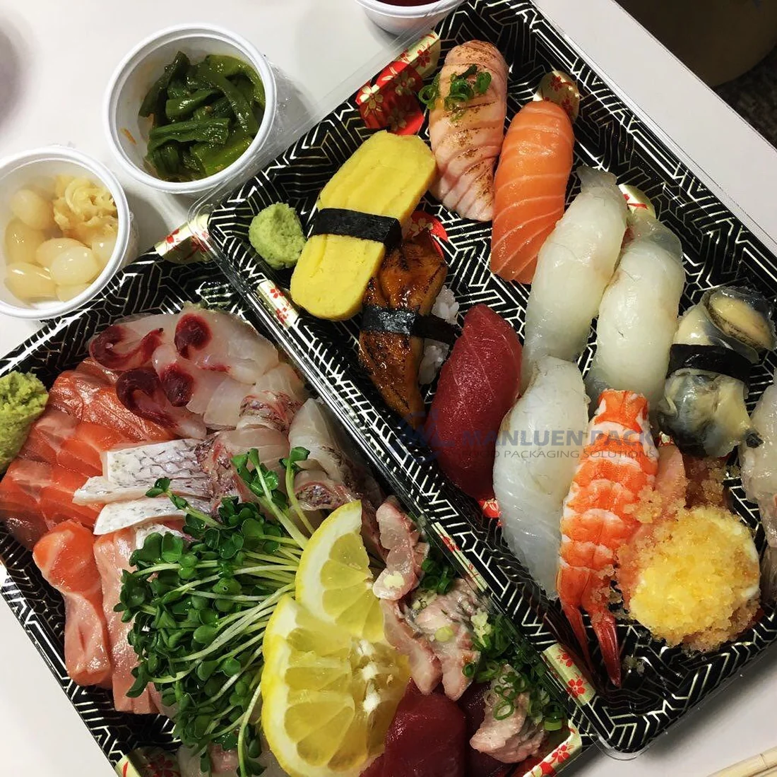 Sushi and sashimi served in decorative WL-09 takeaway trays