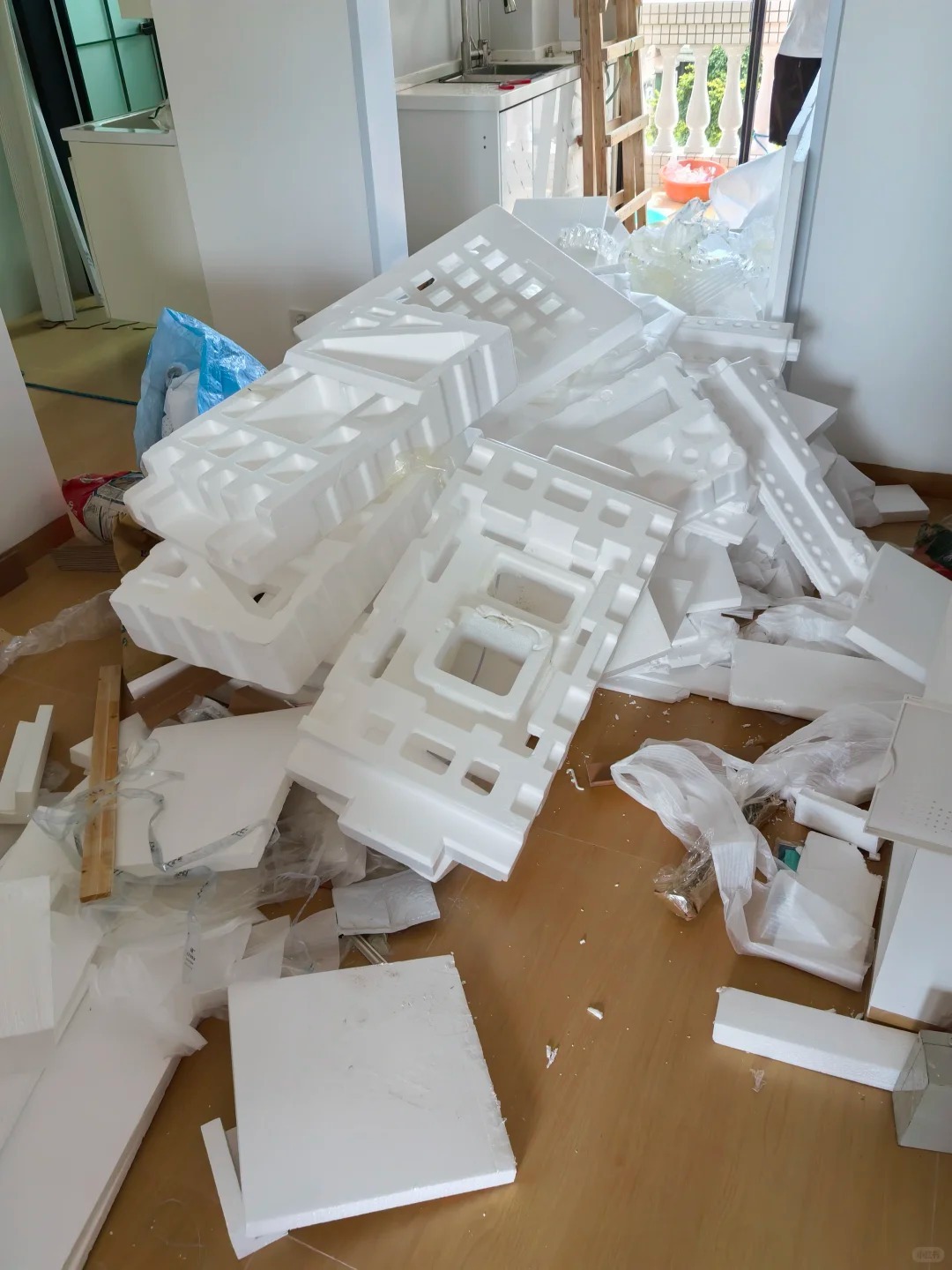 How to Recycle Styrofoam Packaging (2026 Guide) 1 Pile of white EPS foam packaging waste and molded expanded polystyrene packing materials indoors