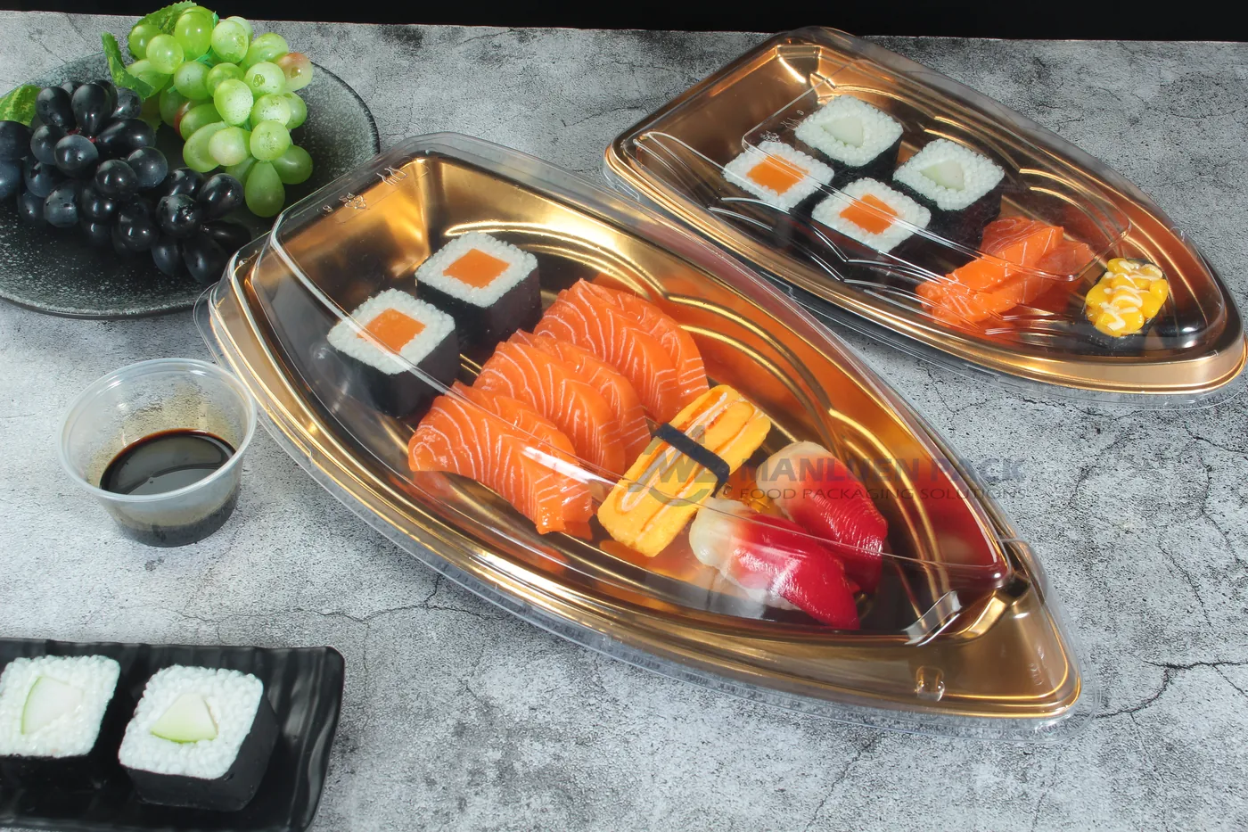 Custom Boat Sushi Party Tray Lifestyle Range | Manluen Pack Custom-size boat sushi party trays displayed with assorted food for wholesale packaging projects
