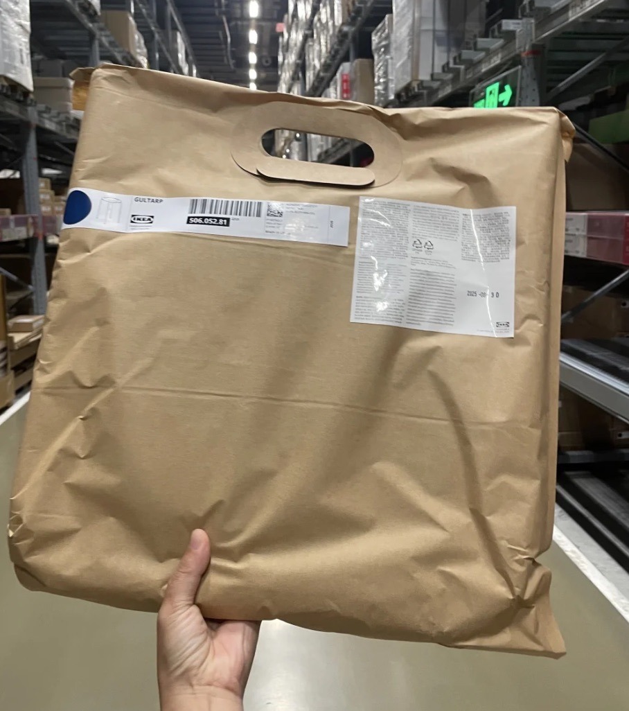 What Are the Three Types of Food Packaging? 7 IKEA brown flexible packaging bag with product label used for warehouse handling and distribution.