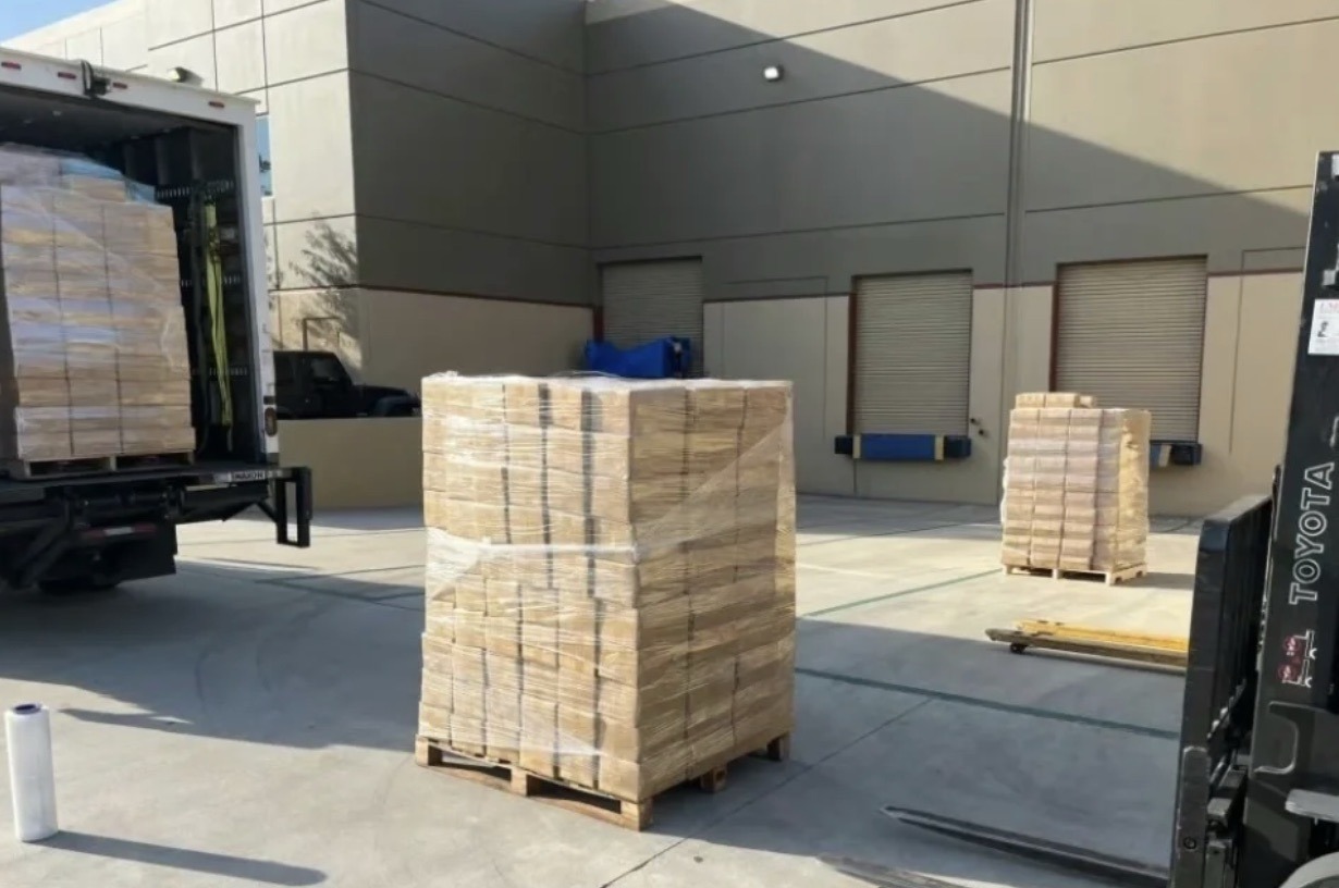 Is Sustainable Packaging More Expensive? A Complete Cost Guide 3 Palletized cartons wrapped with stretch film before shipment from a warehouse.
