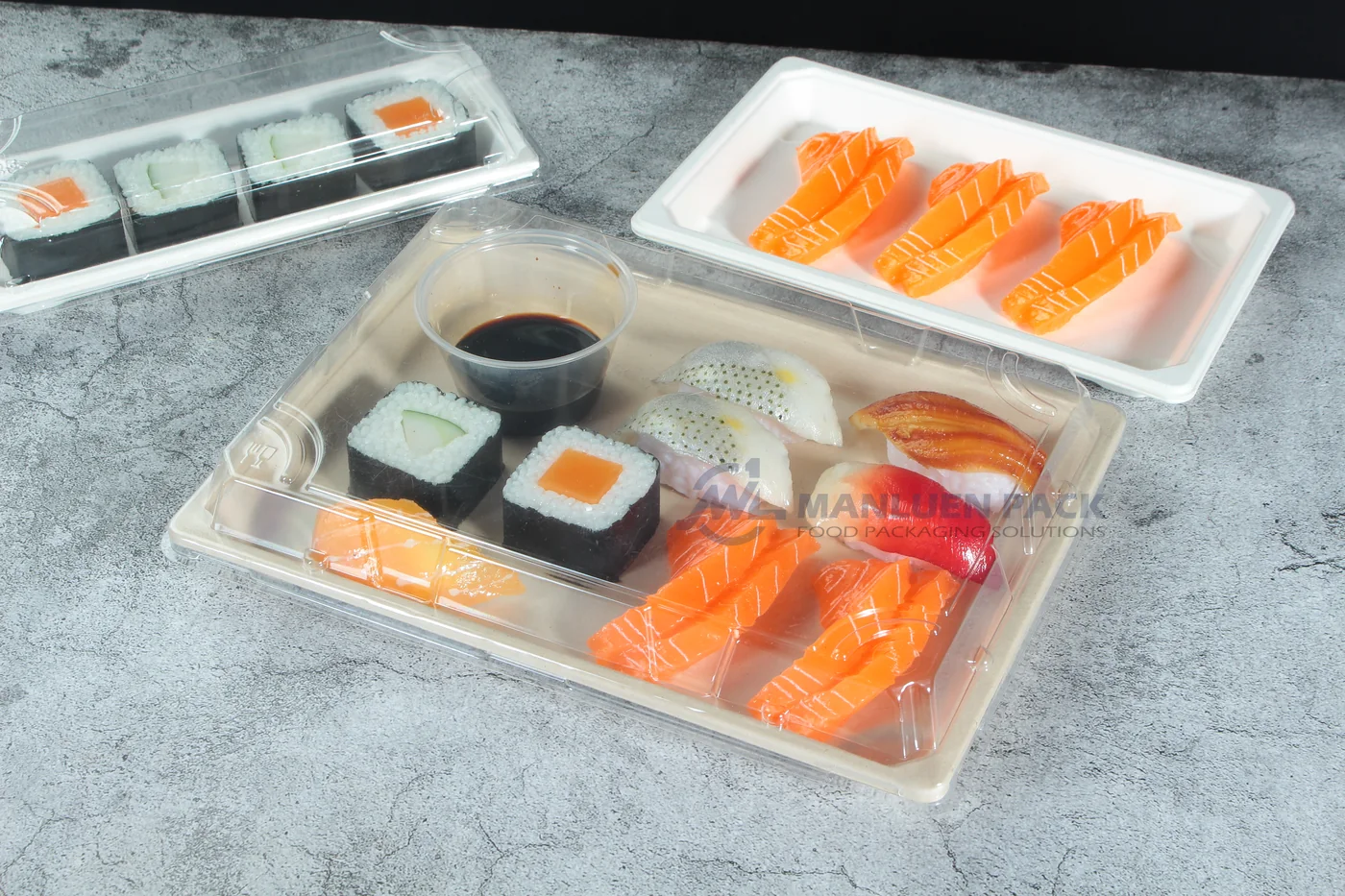 WL-11 bagasse sushi tray with clear lid in a tabletop food presentation
