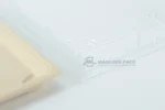 Close-up of a WL-11 bagasse sushi tray and clear lid edge