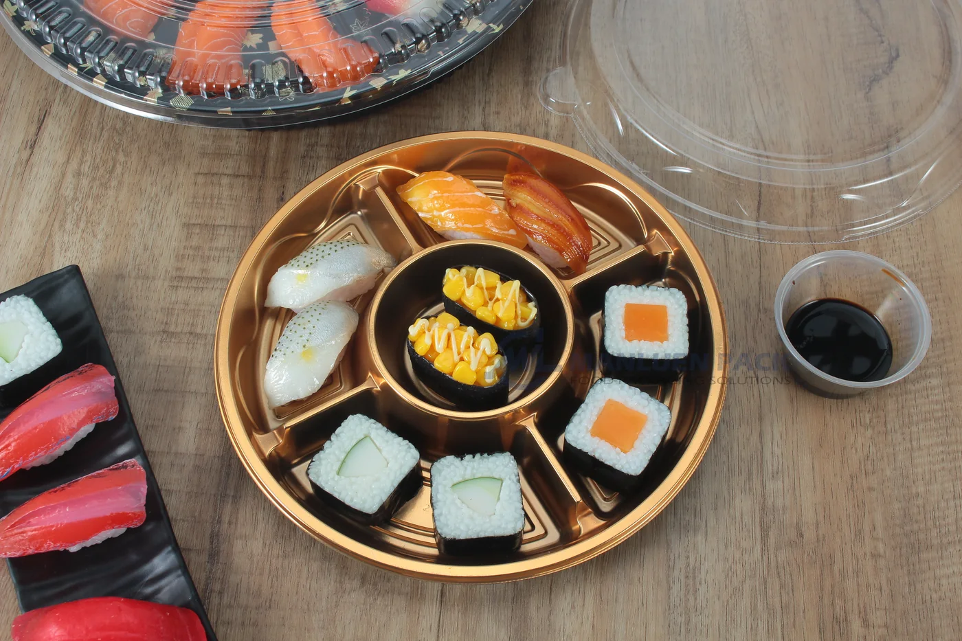 WL-250 sushi packaging shown in a open compartment sushi tray tabletop view