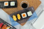 WL-30B covered sushi tray photographed from above in a food display