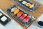 WL-B01 boat shape sushi tray shown in a covered sushi tray tabletop view