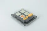 WL-B03 boat shape sushi tray shown in a covered sushi tray studio view