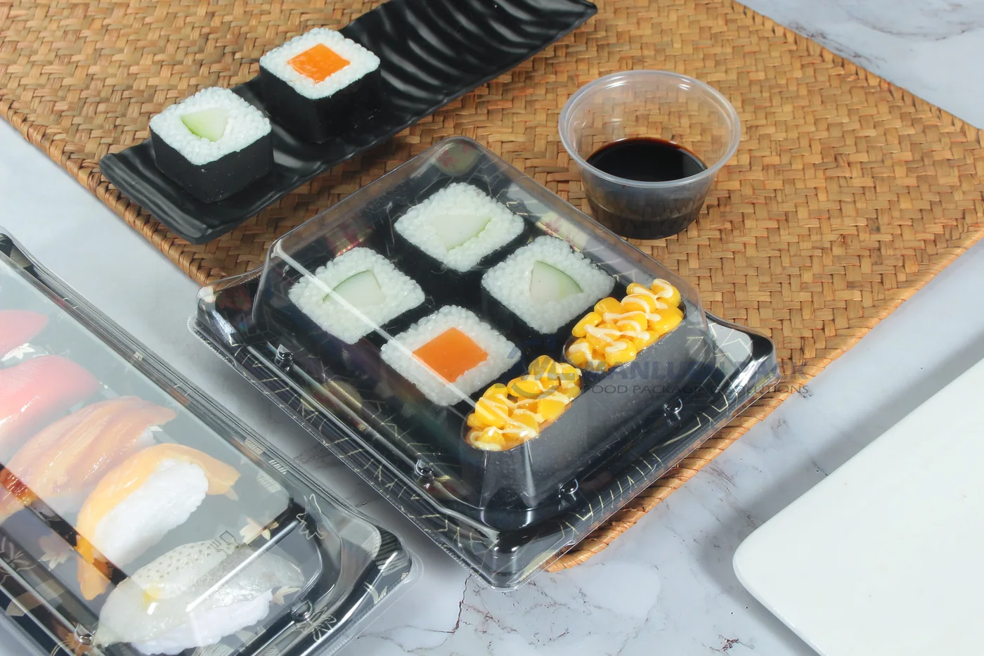 WL-B03 boat shape sushi tray shown in a covered sushi tray tabletop view