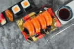 WL-B05 boat shape sushi tray shown in a open salmon tray lifestyle view