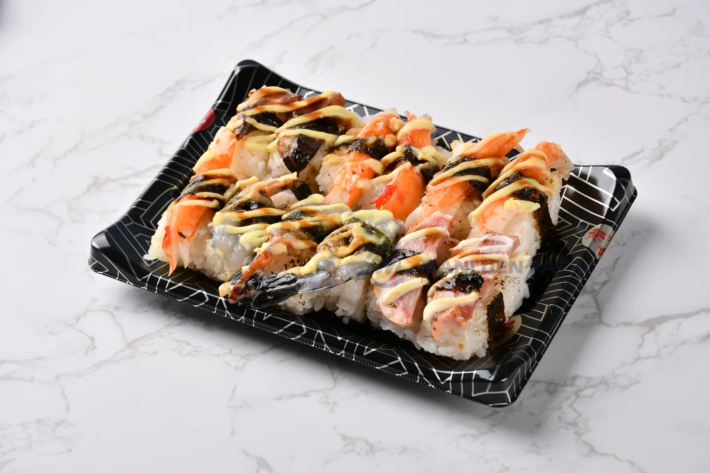 WL-B05 boat shape sushi tray shown in a sushi roll presentation on marble