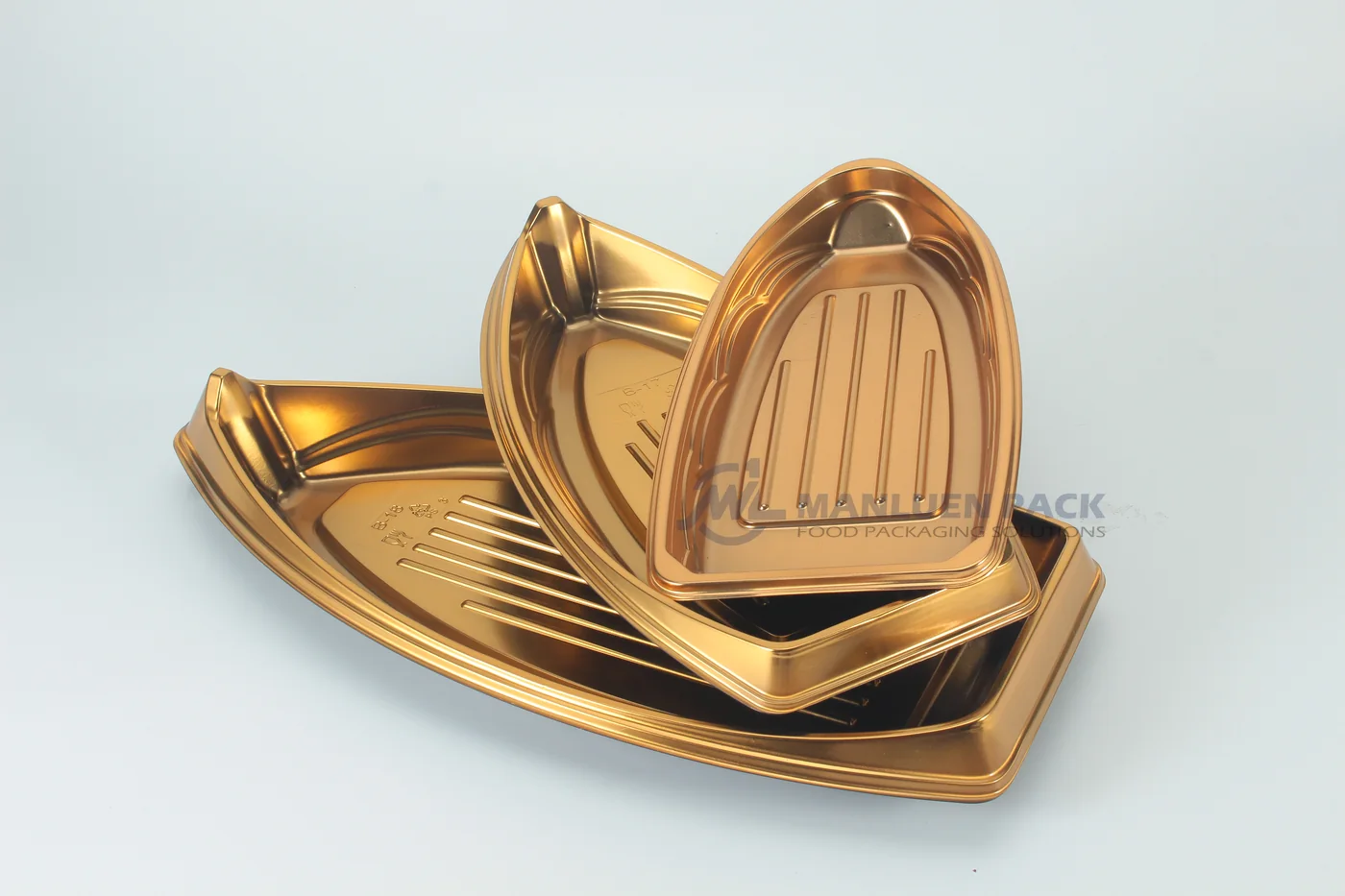 WL-B19 boat shape sushi tray shown in a gold boat tray nesting display