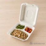 Three-compartment bagasse container with chicken, quinoa and vegetables