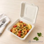 BG91 bagasse hinged clamshell food container filled with garlic shrimp pasta in product view