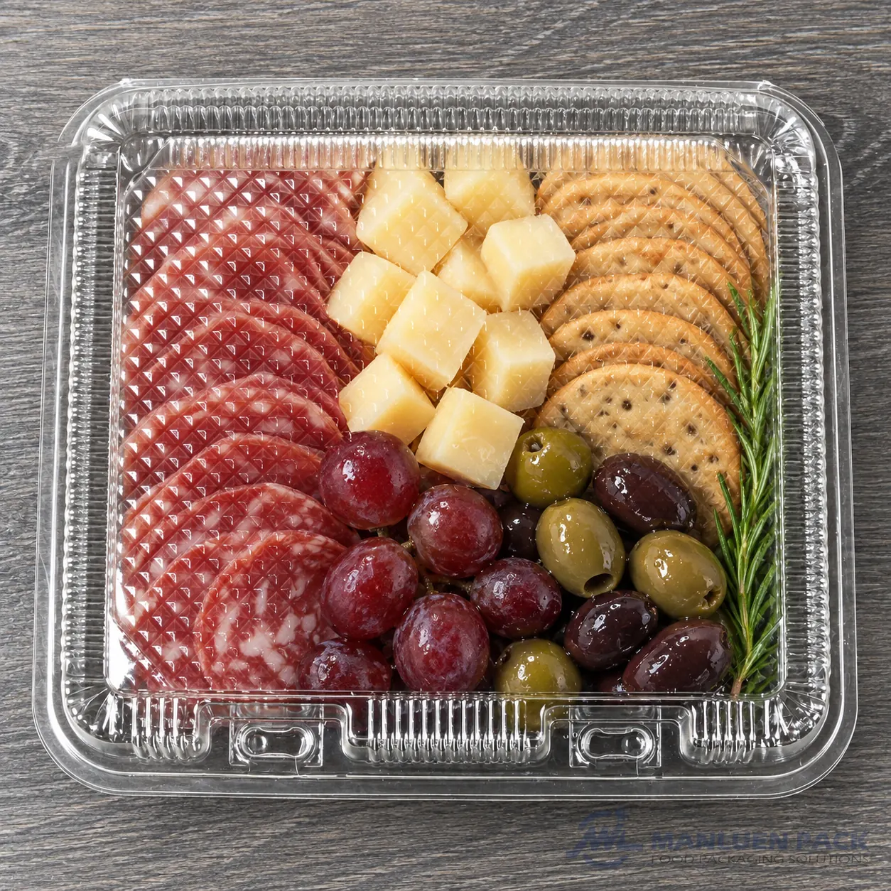 WL-CM004 closed plastic hinged clamshell food container filled with charcuterie in top view